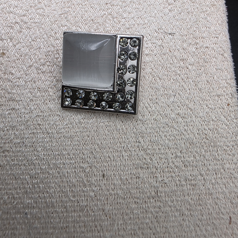 Elegant Silver and White Button (1905)